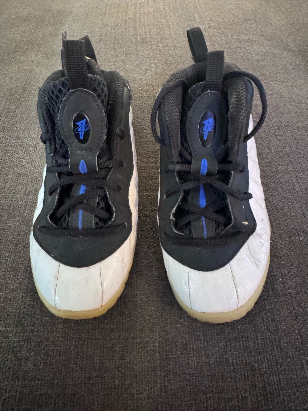 Nike Kids Black White Sneakers with Blue Accents
